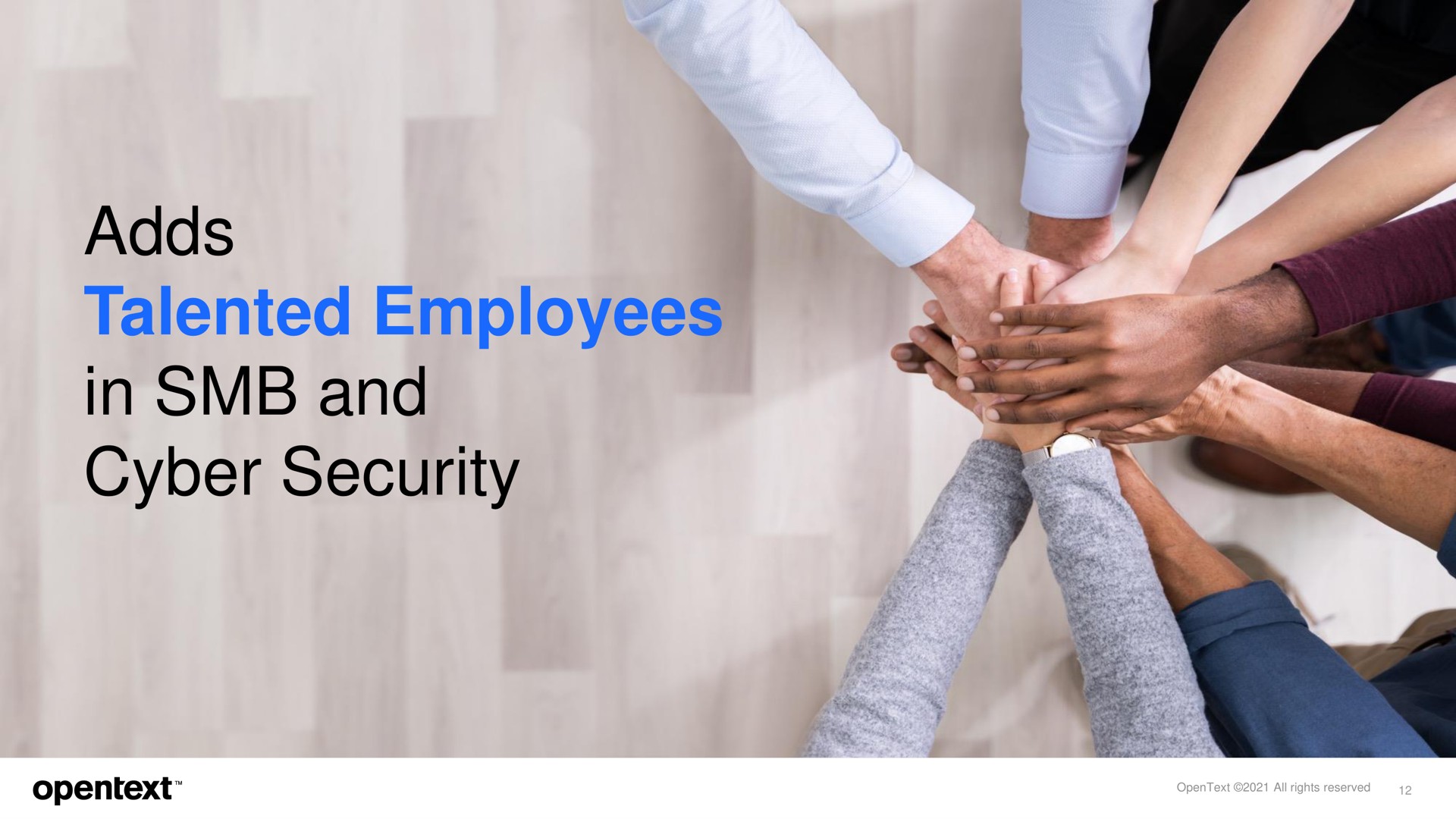 adds talented employees in and security | OpenText