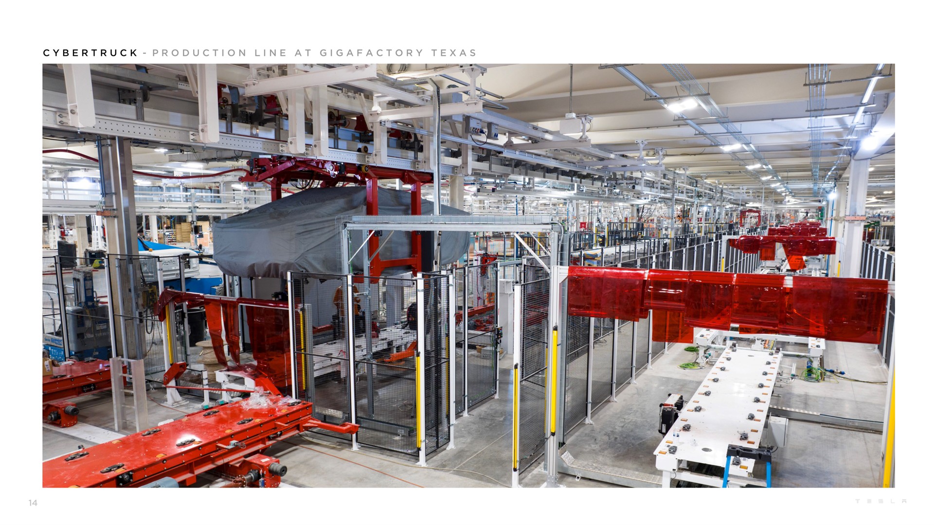 i i a i a a a production line at | Tesla